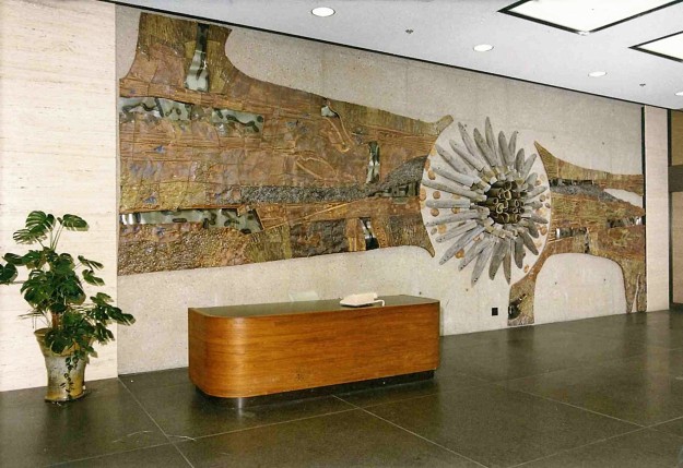 Mural. Alberta Government Telephone, Edmonton Offices. 1971. Stoneware with torch-marked stainless steel and old telegraph poles attached to a raw concrete wall.