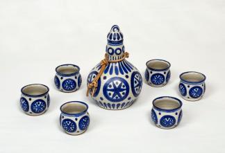 Helga Grove. Saki Set, 1967, white glaze with cobalt blue décor. Bottle and stopper 16.5 x 11 cm; six cups each 4.7 x 5.5 cm. Private collection. Photo: Robert Matheson.