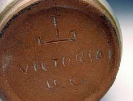Jan Grove incised mark with potter’s wheel and ‘Victoria BC’.