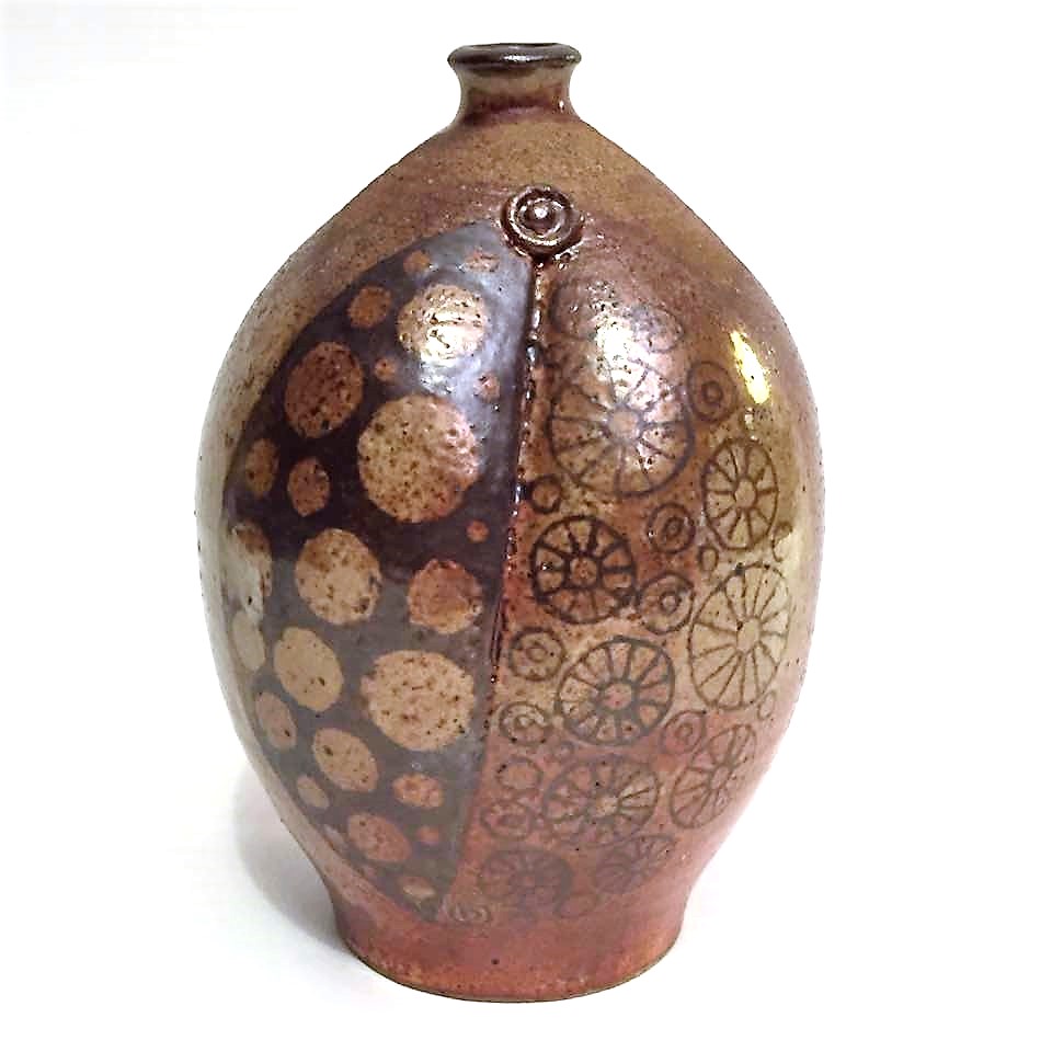 Dean Mullavey. 2011. Vase. Shino glaze with flying ash deposit, wood fired at cone 10 Stoneware. Height 6.75 inches. Photo: Vasefinder International 2012